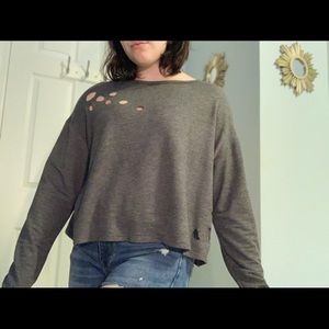Distressed cropped grey top